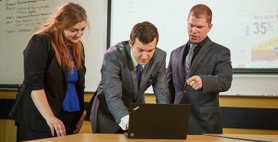 People using a laptop