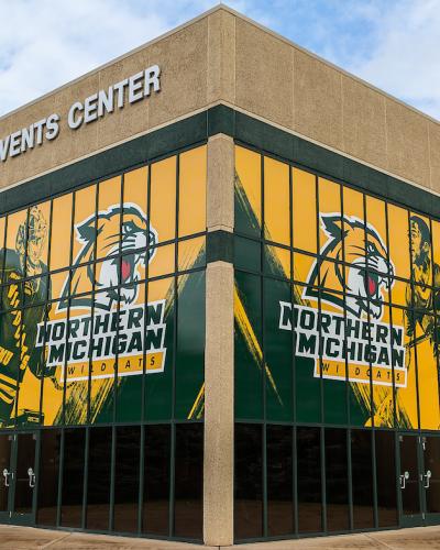Berry Events Center with athletic graphics on the windows