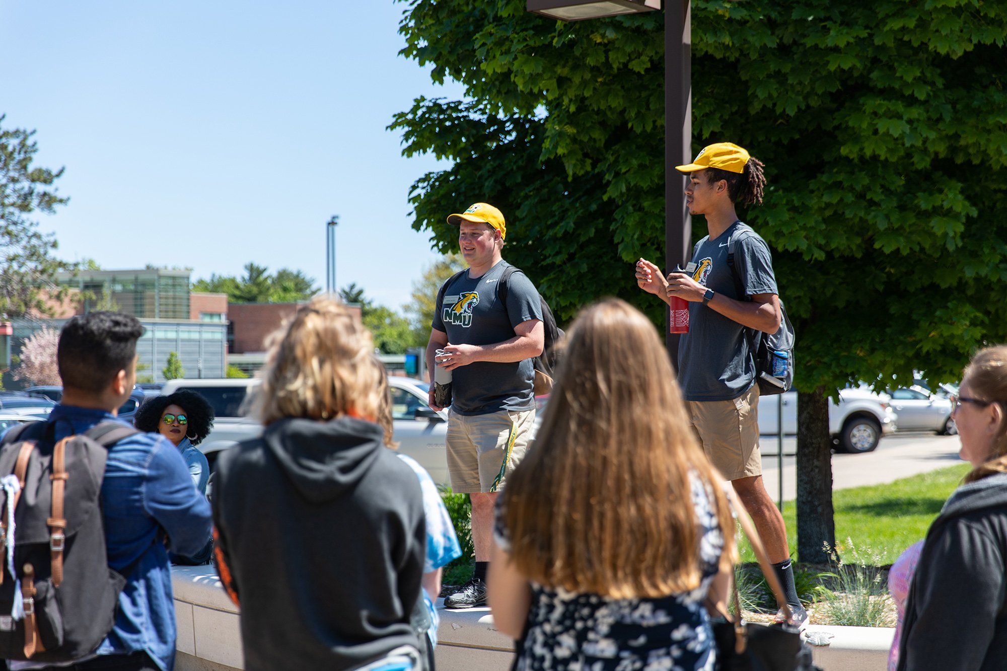 Two NMU students leading a campus visit
